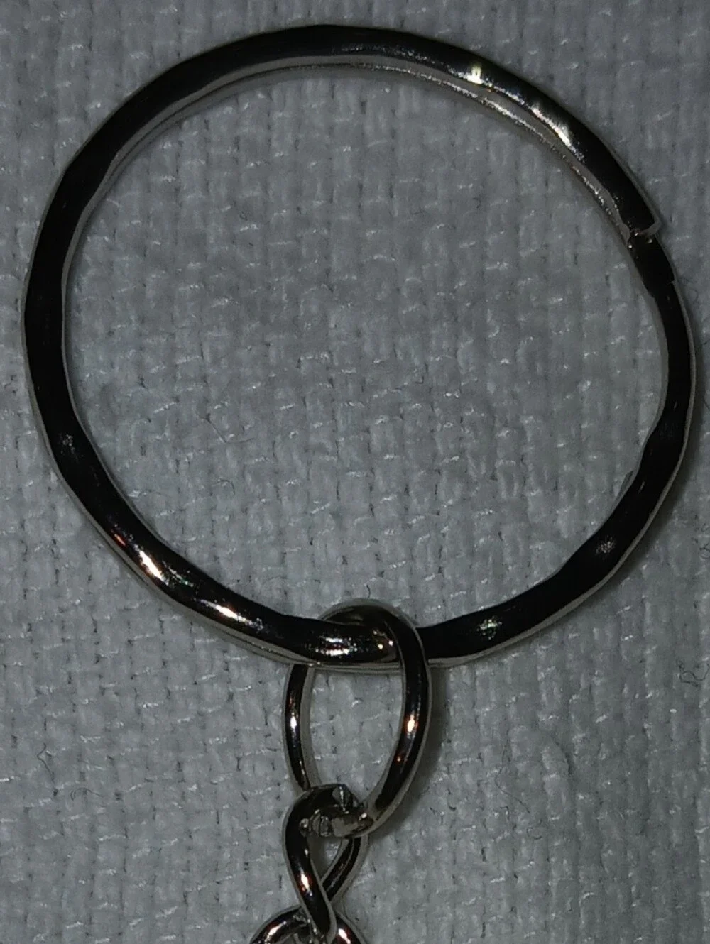 NWT Silver-Tone Orange and Black C.B. Team Keychain.